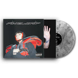 Vinyl record with a black cover featuring a person in red and black gear, and a clear vinyl disc.