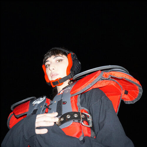 Album cover of Pixel Grip's 'Arena' with a person wearing a red and gray backpack against a black background