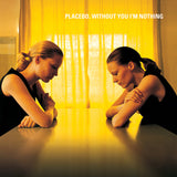 Album cover for Placebo's 'Without You I'm Nothing' with two people leaning on a table under yellow lighting.