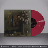 Vinyl record with a stylized cover featuring a still life painting and pink flowers on a gray background.
