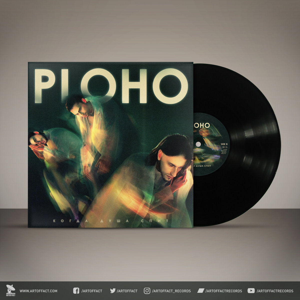 Vinyl record with cover featuring artistic design and 'PLOHO' branding.