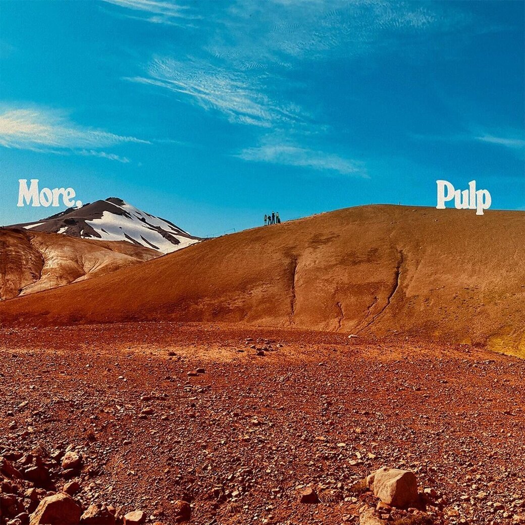 Desert landscape with mountains and 'More. Pulp' text on a blue sky background