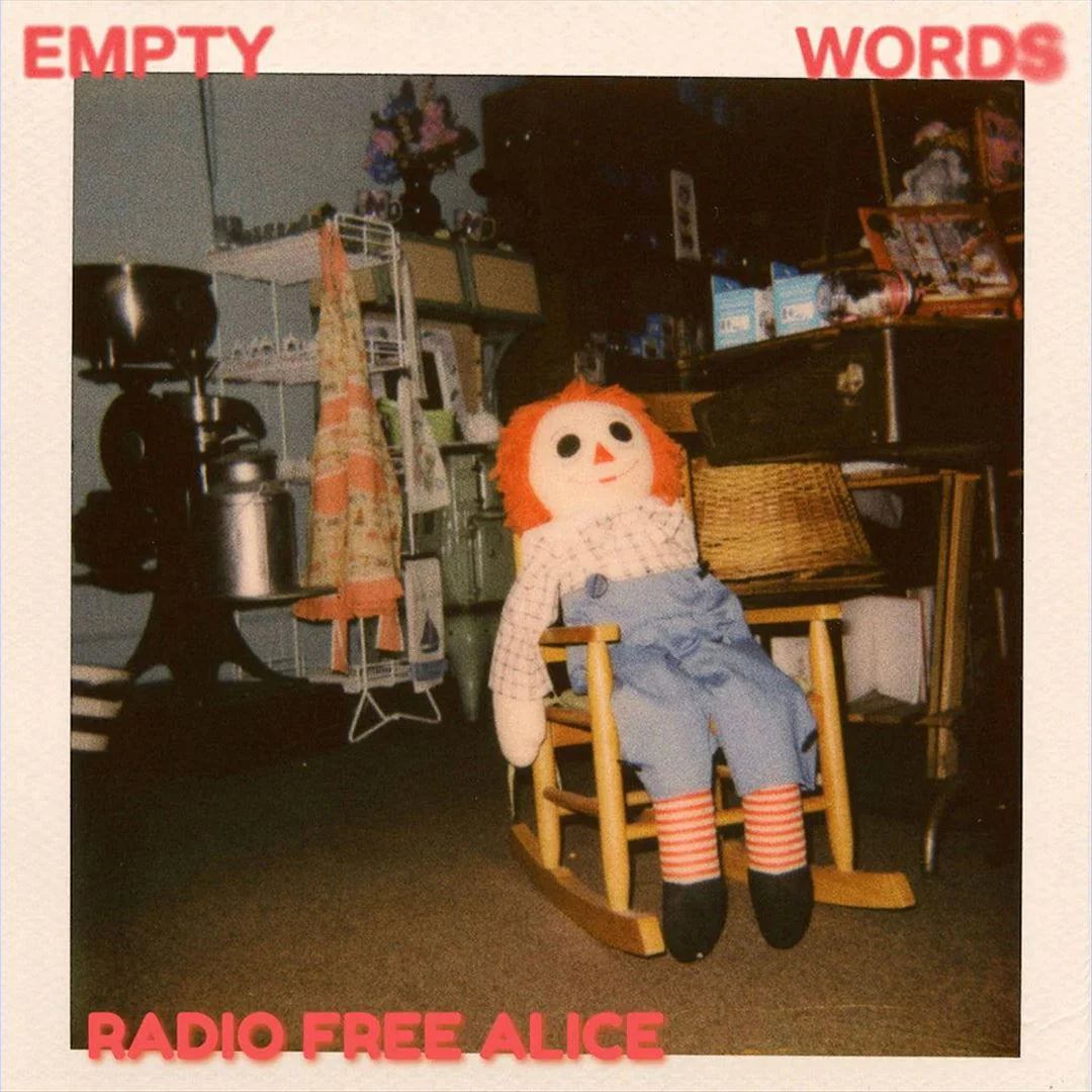 Vintage-style album cover with a doll sitting on a chair in a room, featuring text 'EMPTY WORDS' and 'RADIO FREE ALICE'.