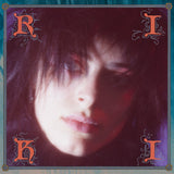 Riki self-titled album cover with a stylized face on a dark background