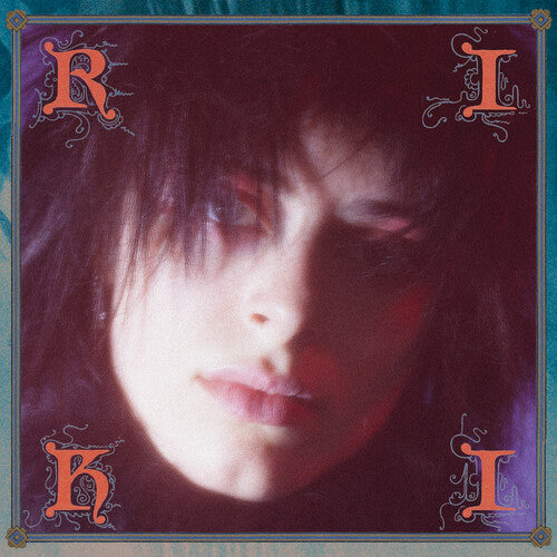 Riki self-titled album cover with a stylized face on a dark background