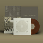 Vinyl record with cover and additional material on a brown background
