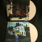 Sally Shapiro - Ready To Live A Lie  2 white vinyl records with a house and flowers on a windowsill on the covers