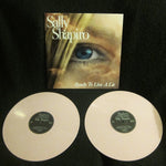 Vinyl records with a cover featuring an eye and 'Sally Shapiro - Ready to Live a LIe" text