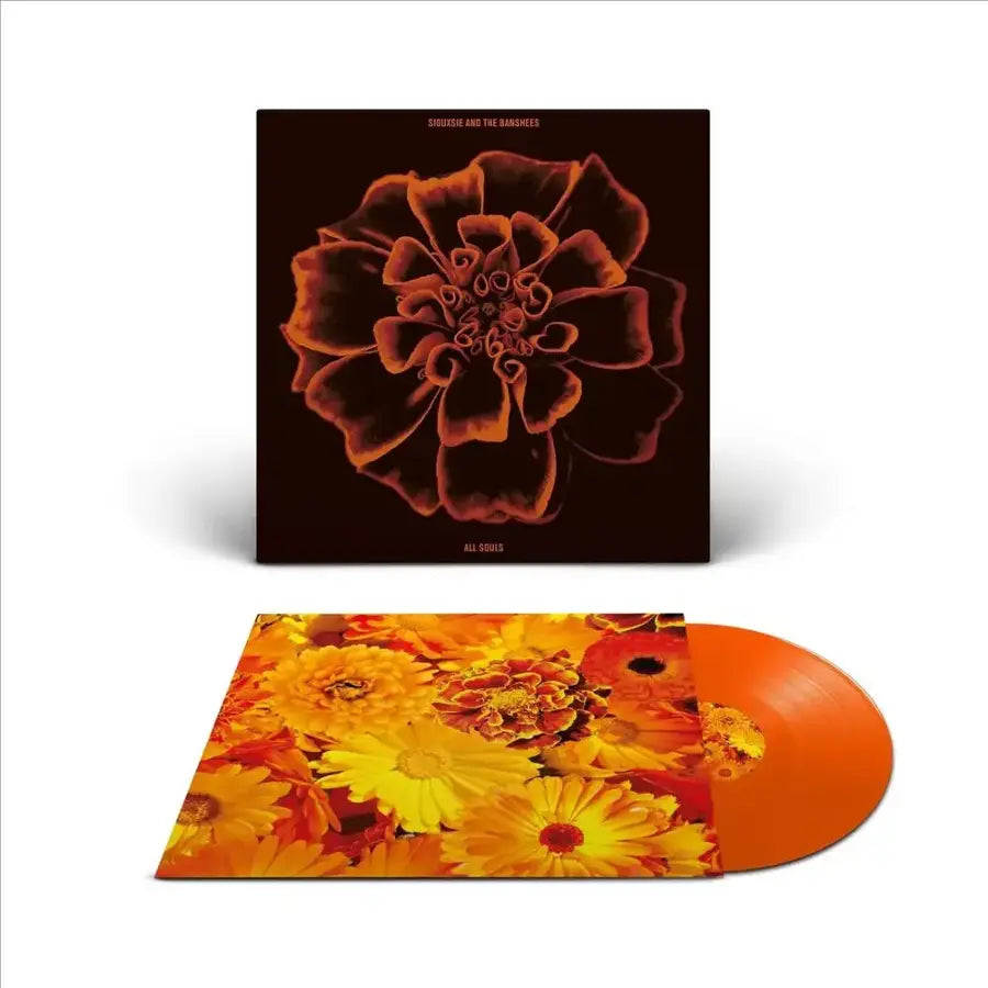 Album cover with a stylized flower design on a dark background, featuring the text 'Siouxsie and the Banshees' and 'All Souls.' Orange flower insert with orange vinyl. 