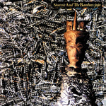 Album cover with a face sculpture and music bars, featuring the text 'Siouxsie and the Banshees: Juju'.