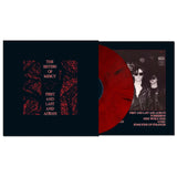The Sisters of Mercy - First and Last and Always red vinyl record with black cover featuring red text and a black and white photo of two people.