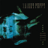 Album cover with abstract design and 'Skinny Puppy - Vivi Sect Vi' text on a dark background