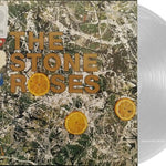 Clear vinyl record with 'The Stone Roses self titled' album cover featuring a textured design and lemon slices.