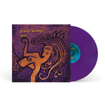 Purple vinyl record with artistic cover featuring a stylized figure and 'strange boutique' text.