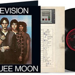 Vinyl record with cover and inner sleeve featuring a band portrait and album details.