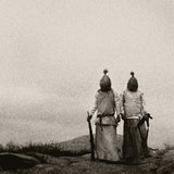 The Body - All The Waters Of The Earth Turn To Blood album cover showing two people with heads covered standing on a hill with a textured overlay