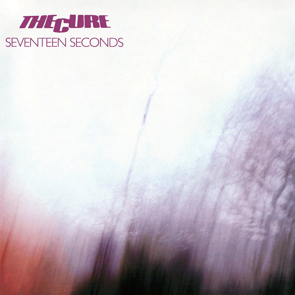 Album cover for 'Seventeen Seconds' by The Cure with abstract design and text.