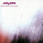 Album cover for 'Seventeen Seconds' by The Cure with abstract design and text.