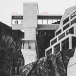 Album cover with architectural design and text 'The KVB Tremors' on a mountainous background