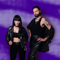 Album cover for Ultra Sunn's "Us" with two people in black outfits against a purple background