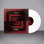 Vinyl record with red and black cover titled 'Urban Heat Wellness' on a gray background