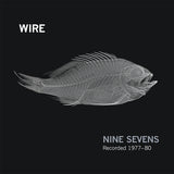 Album cover for Wire - Nine Sevens  with a fish skeleton illustration on a black background