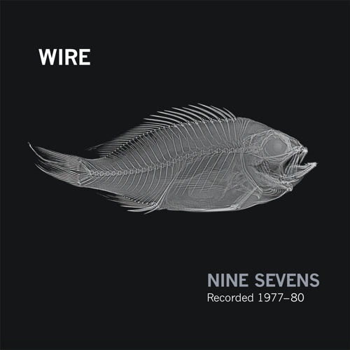 Album cover for Wire - Nine Sevens  with a fish skeleton illustration on a black background