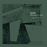 Album cover for 'Not About To Die' by Wire with abstract green and black design and text.