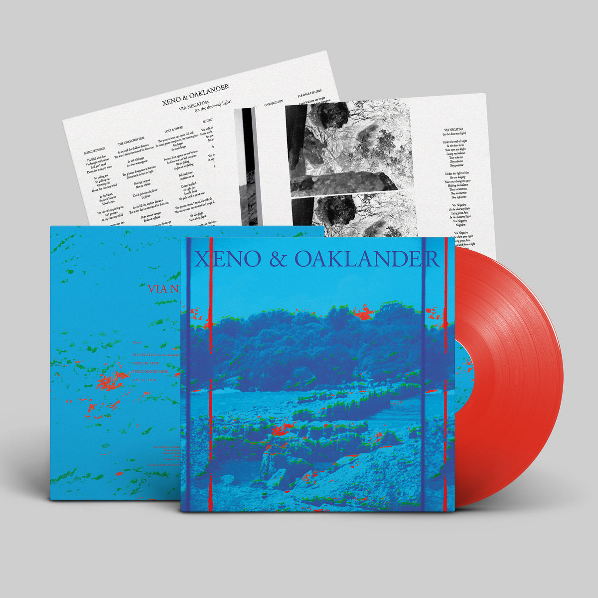 Vinyl record for Xeno & Oaklander – Via Negativa (In The Doorway Light) with blue cover and red disc.